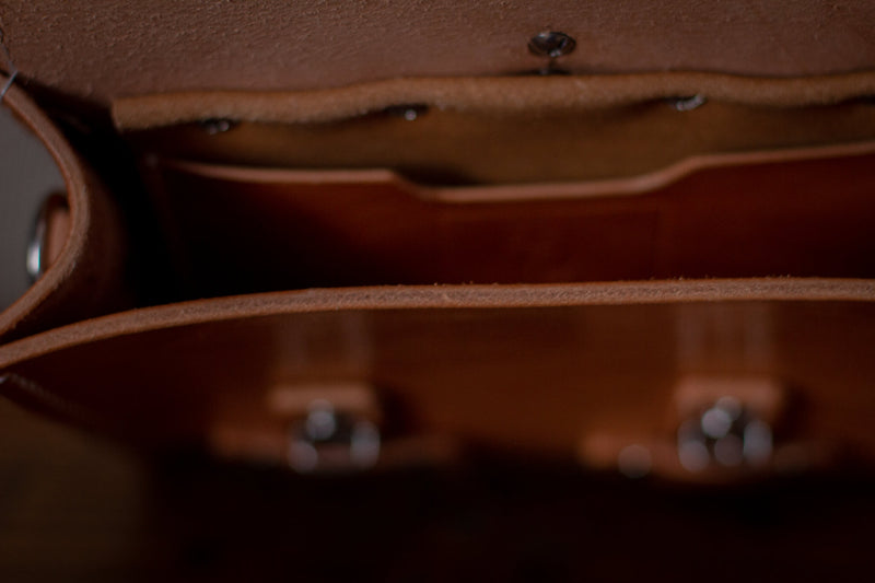 saddle maker leather bag interior