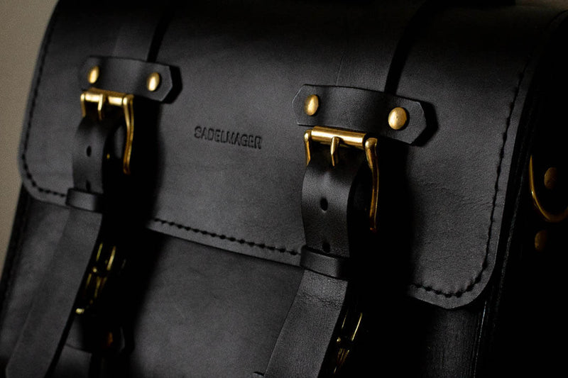 close up black leather satchel made in canada