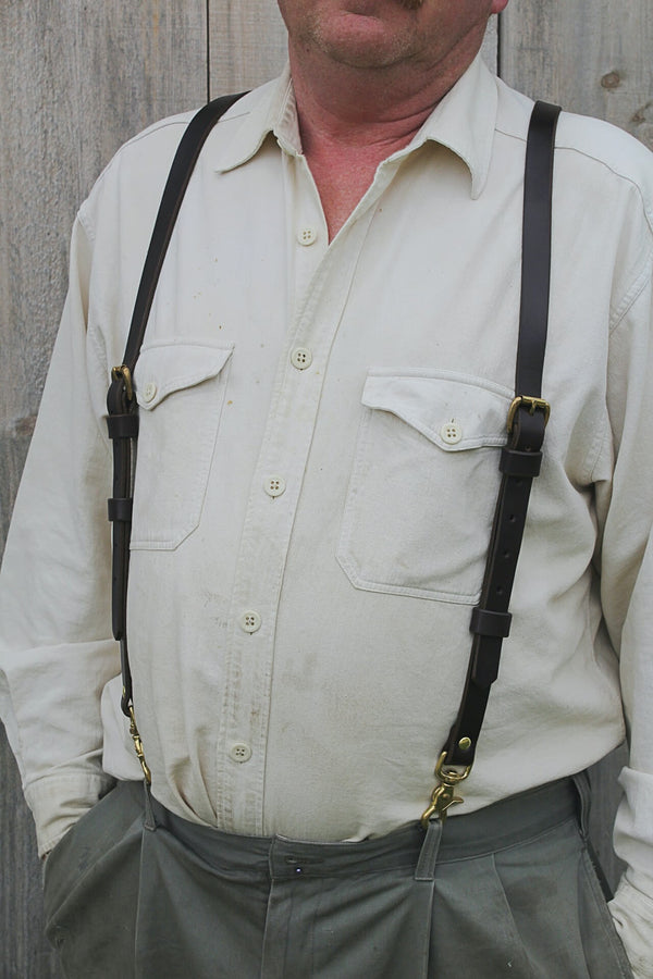 closeup front shot of man modelling Sadelmager Leather Fjord suspenders