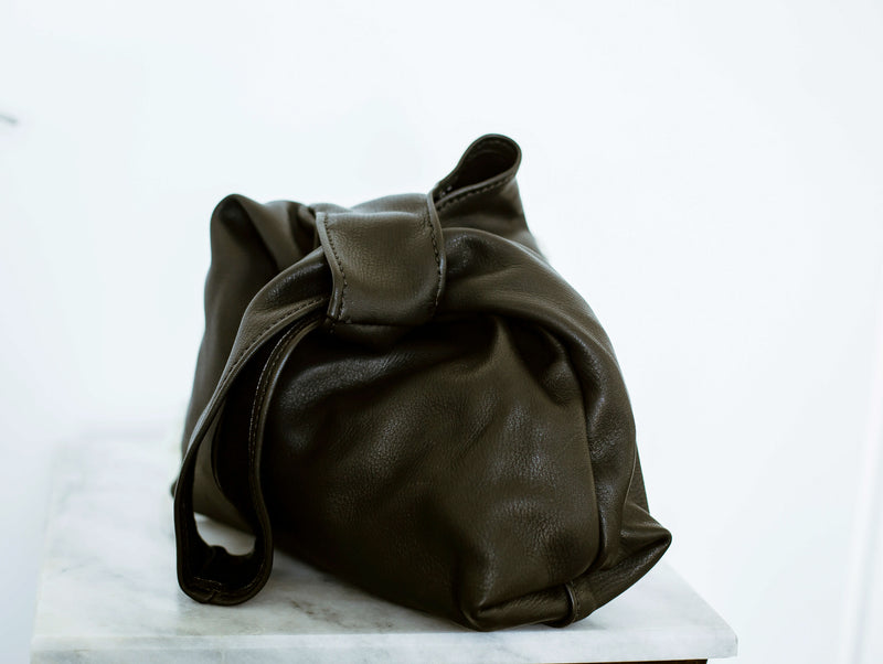 simple minimalist knot bag black leather