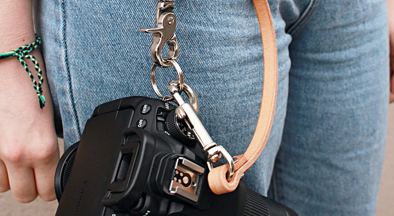 women modelling Sadelmager Leather Fjord Crossbody camera strap closeup camera