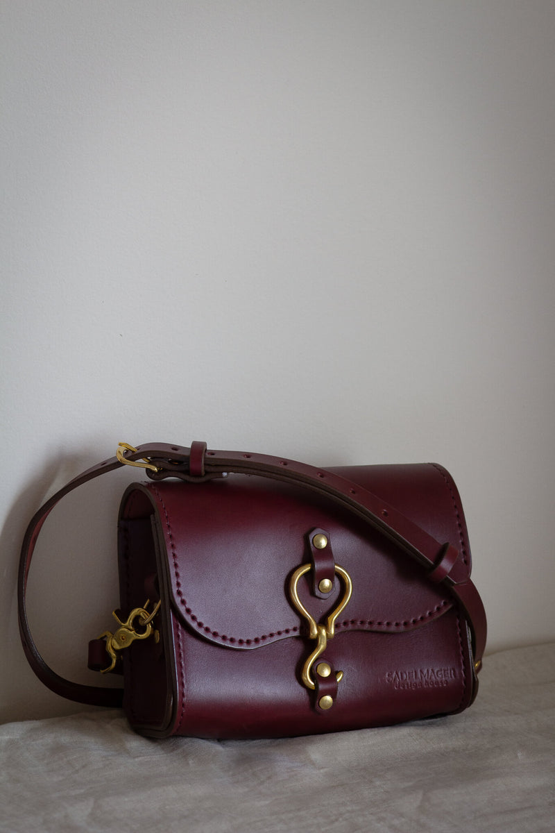 leather bag made in canada purse brass and red