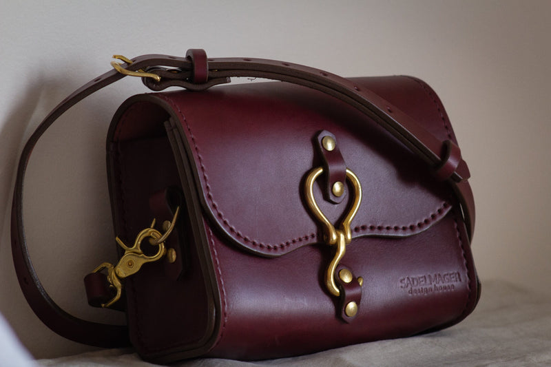 unique closure crossbody leather purse 