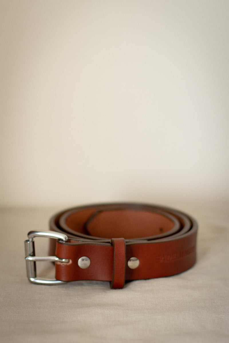 leather saddle maker belt brown and stainless