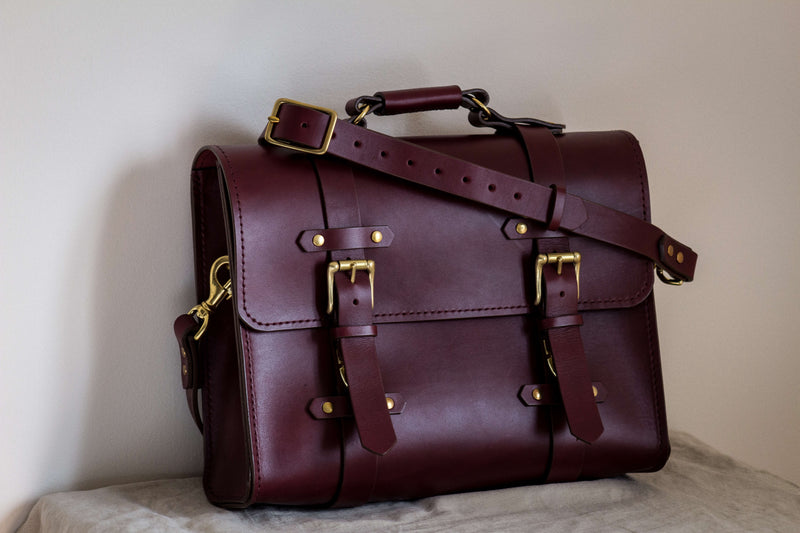 oldenburg large messenger satchel made in canada with a crossbody strap in red oxblood leather