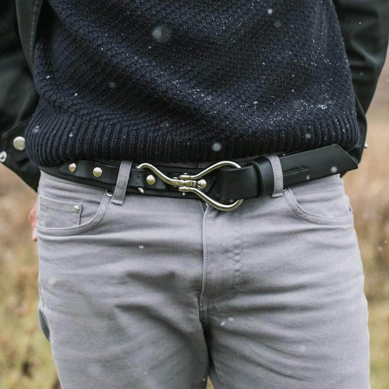close up of man wearing leather shire belt 1-1/4" in black with stainless steel hook