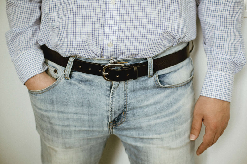 closeup of man wearing leather morgan belt 1-1/4"in black with stainless steel buckle 